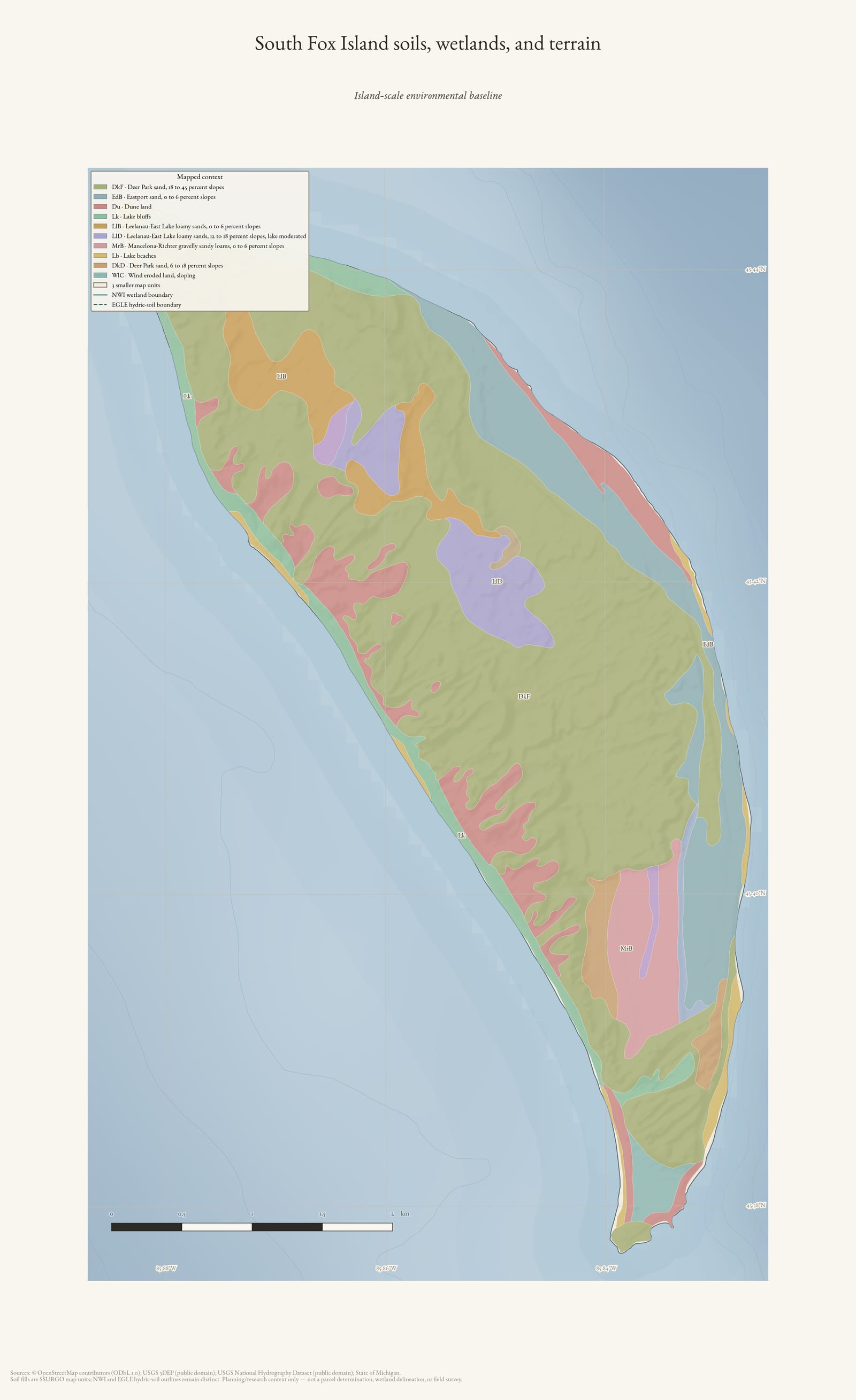Environmental atlas map of South Fox Island showing soil map units, wetland and hydric-soil outlines, hydrography, and shaded terrain.