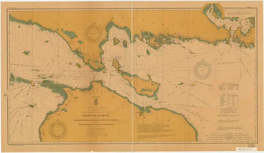 Nautical chart showing coastlines, islands, soundings, navigation lines, compass roses, and printed notes.