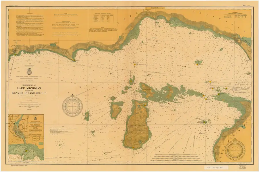 Colored nautical chart with coastlines, soundings, navigation marks, compass roses, and a harbor inset.