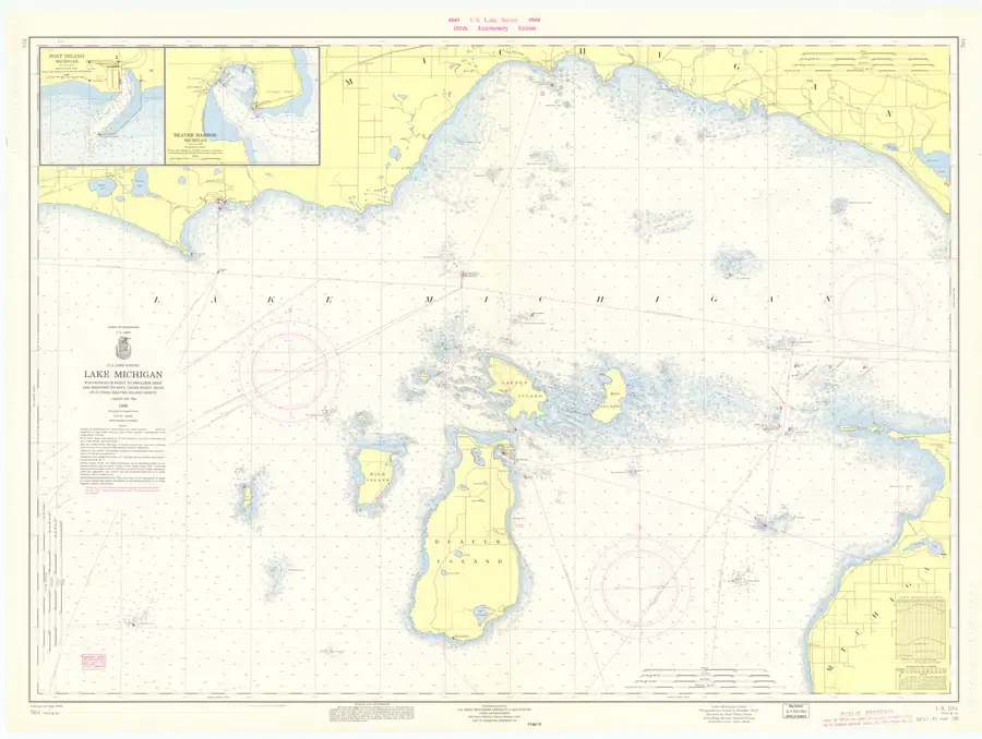 Nautical chart showing a broad waterway, surrounding shorelines, depth soundings, navigation marks, and inset harbor plans.