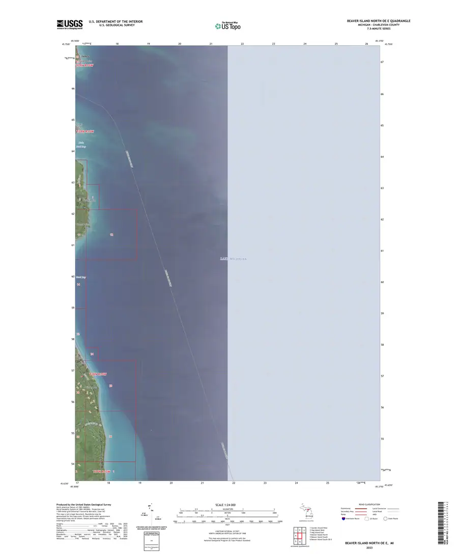 Topographic map showing a coastal strip, open water, survey grids, legends, and map furniture.