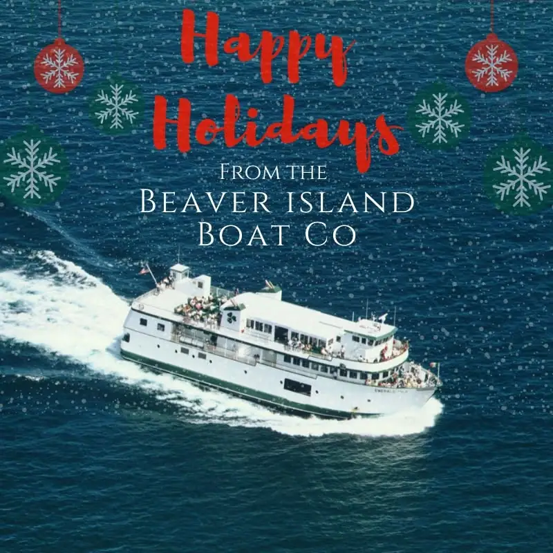 Holiday graphic showing a passenger ferry underway beneath a large seasonal greeting.